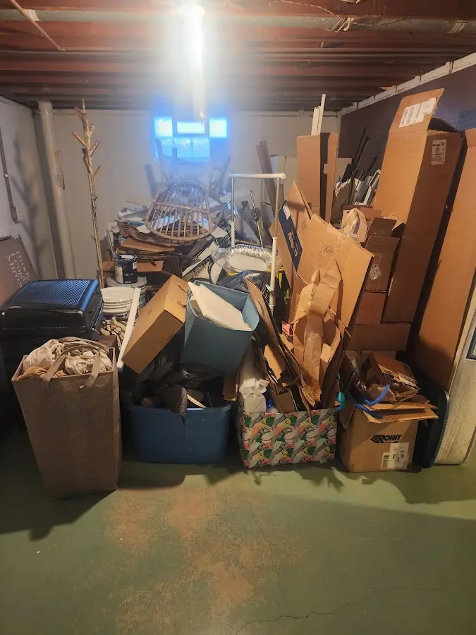 Roll-off dumpster container at job site for 20 Yard Dumpster Rental in Iosco